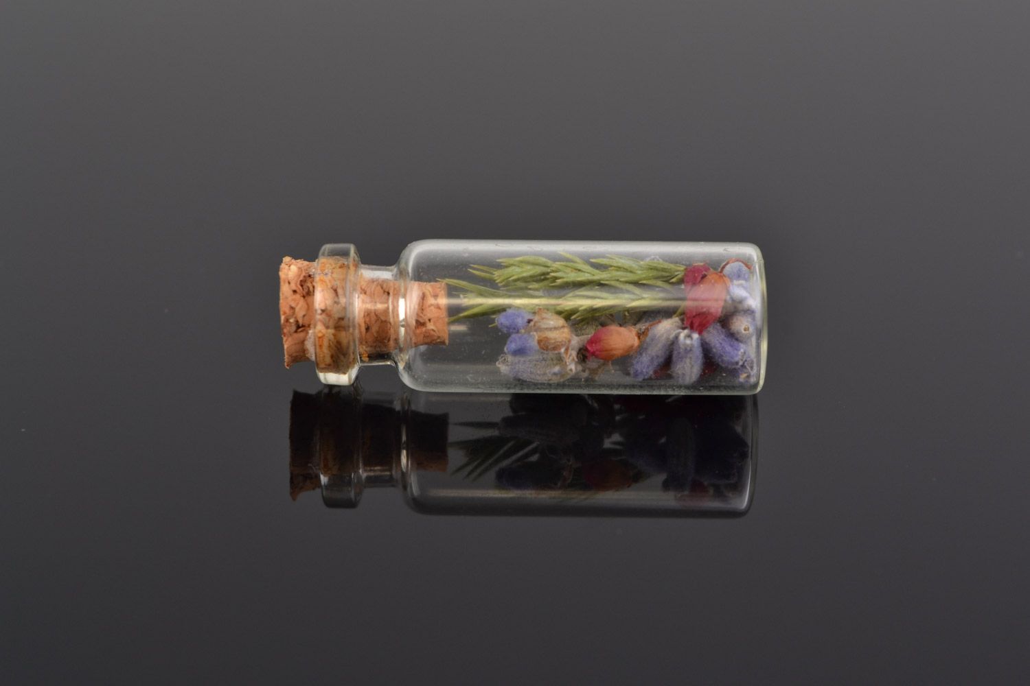 Unusual beautiful handmade small flask pendant with dried flowers inside photo 1