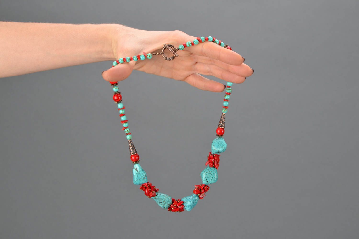 Natural stone necklace of red and turquoise colors photo 2