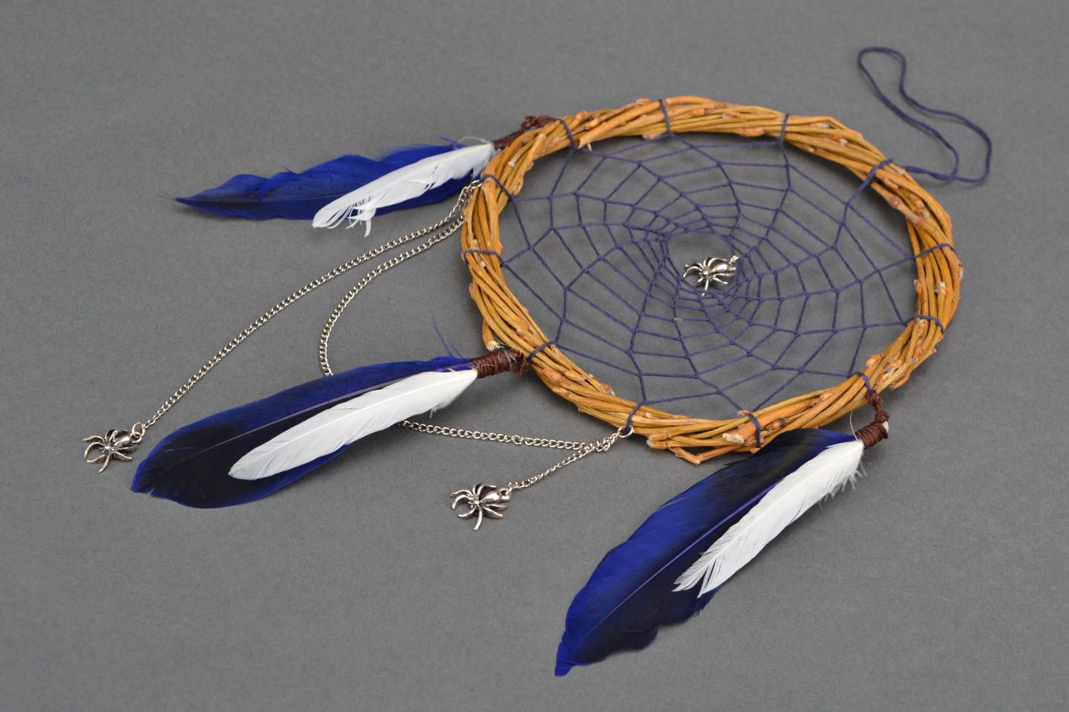 Dreamcatcher with duck feathers photo 1