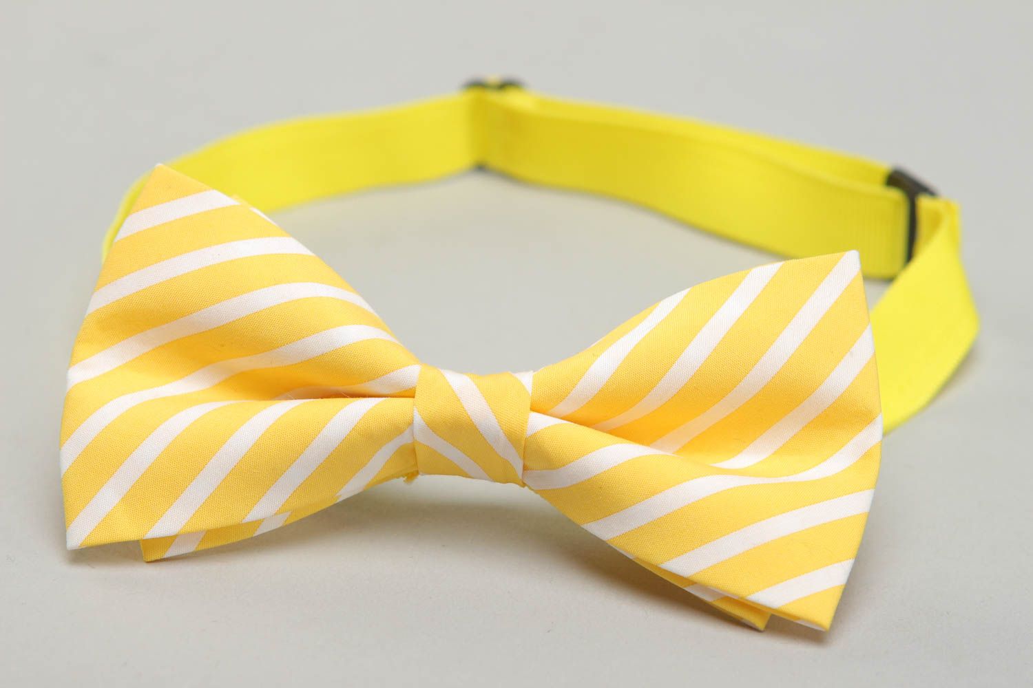Lemon-colored fabric bow tie with stripes photo 2