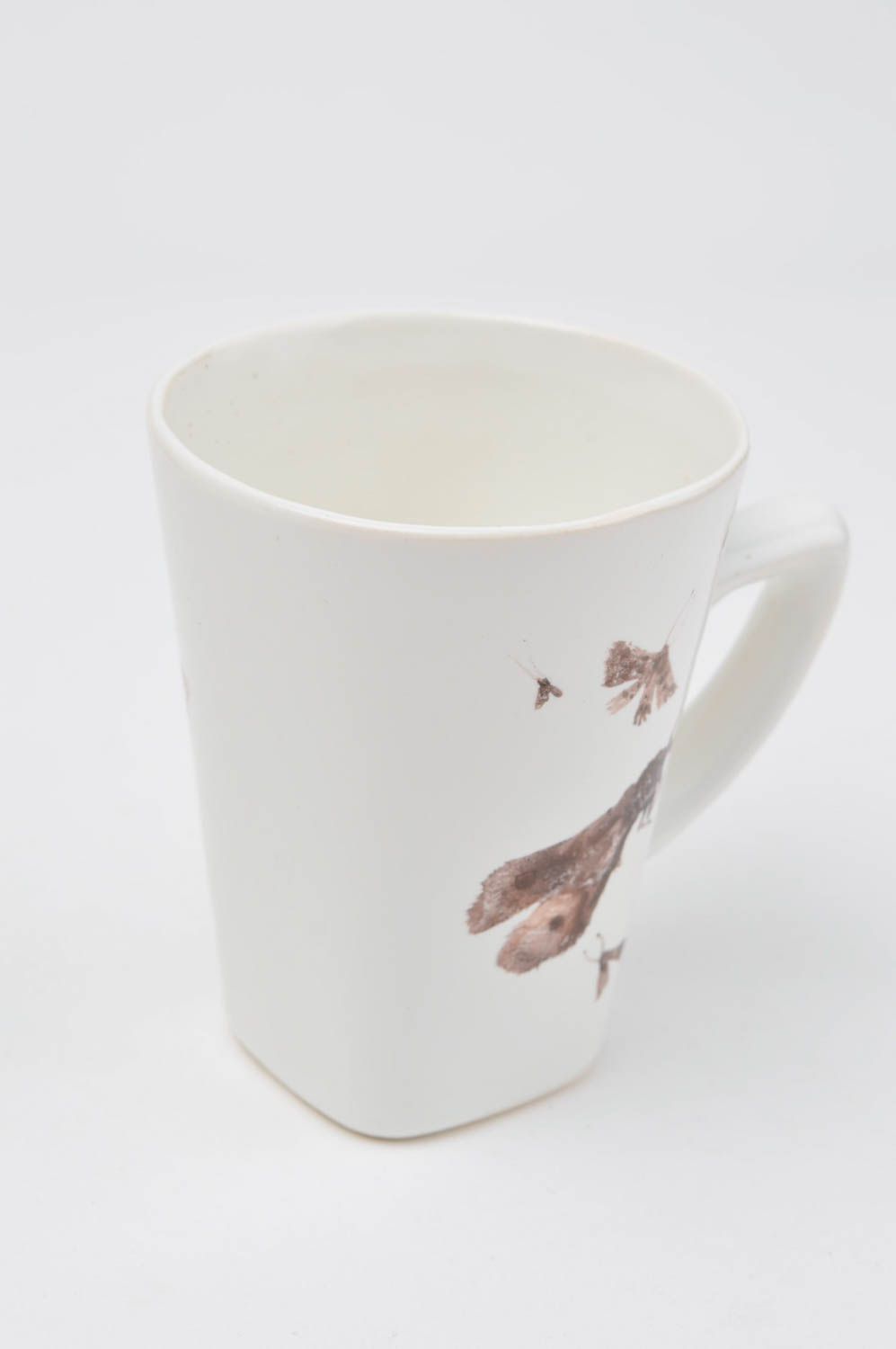 White porcelain teacup with handle and hand-painted pattern photo 2