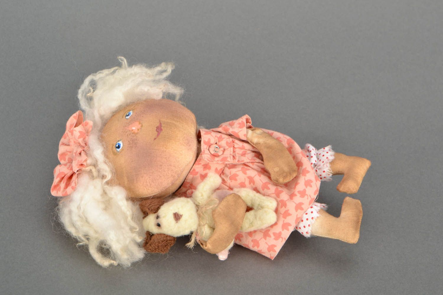 Soft doll with a dog photo 3
