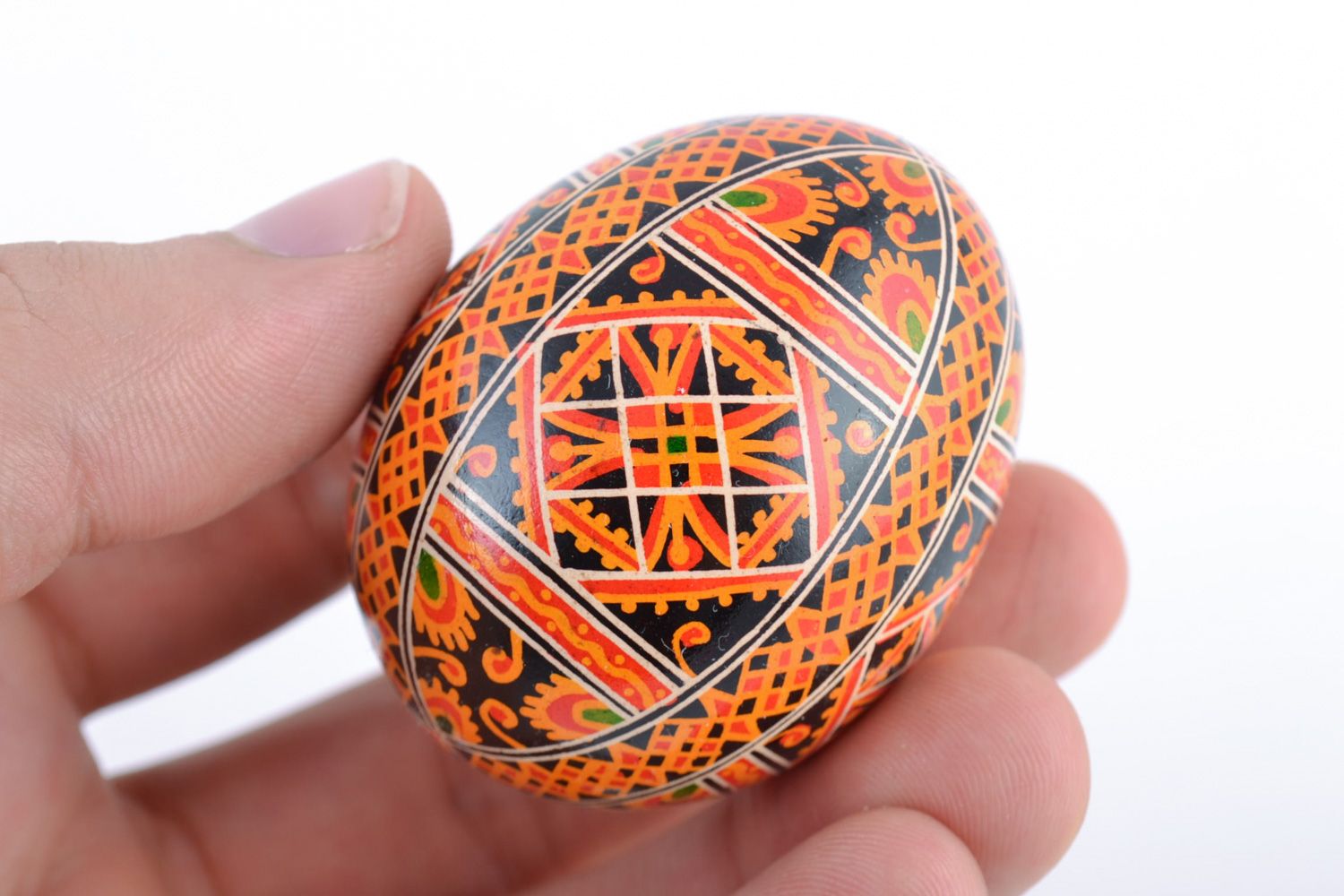 Bright handmade painted chicken egg with traditional Slavic patterns for Easter photo 2