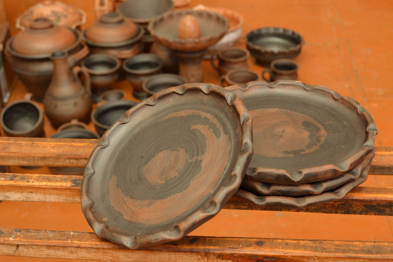 Set of ceramic plates photo 1
