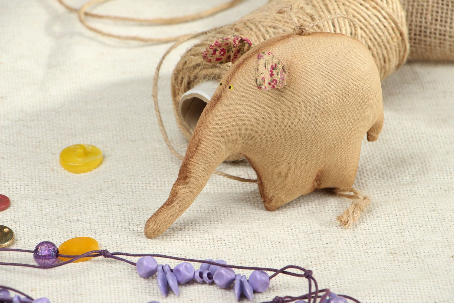Brinquedo-pingente de tecido Elefante de café foto 1