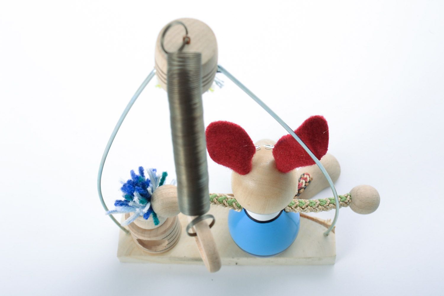 Handmade decorative painted eco friendly wooden toy of rabbit on swing  photo 5