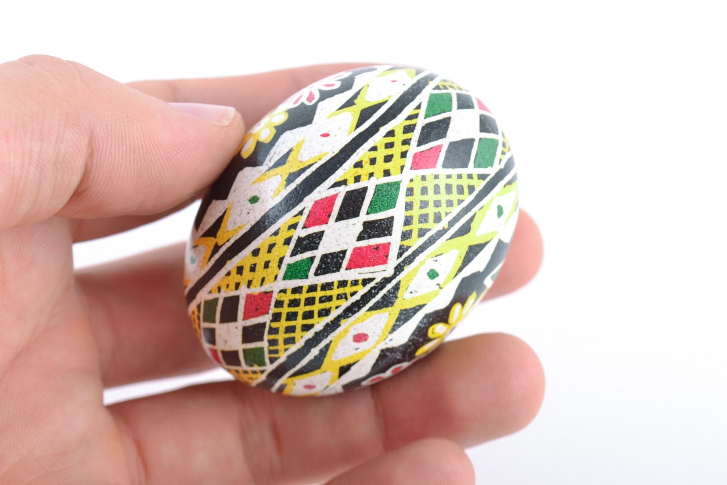 Homemade painted chicken egg with flower pattern for Easter photo 2