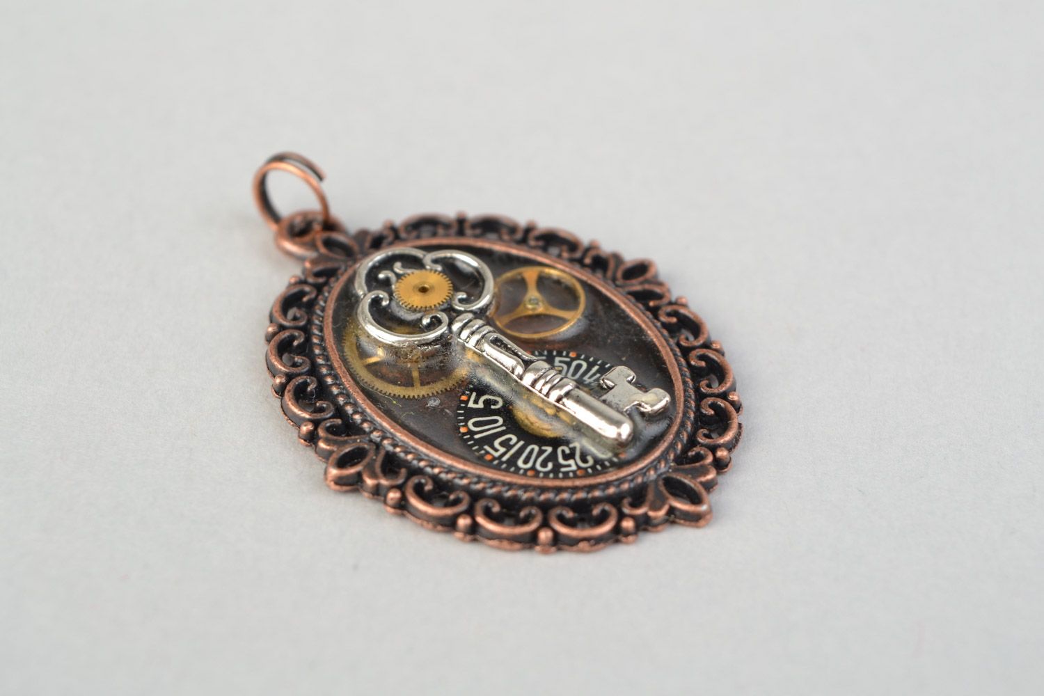 Handmade designer oval metal pendant with key in steampunk style for women photo 4