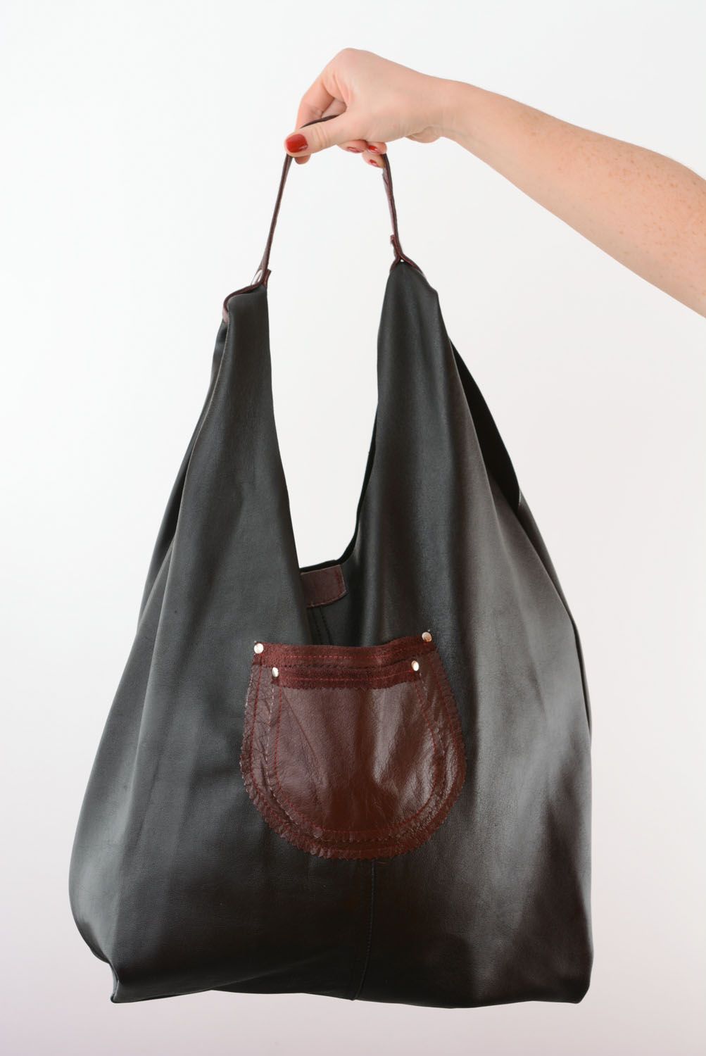Schwarze Handtasche aus Leder foto 3