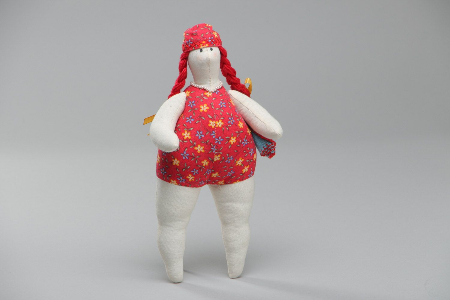 Handmade beautiful soft toy sewn of cotton and linen in red swimming suit  photo 2