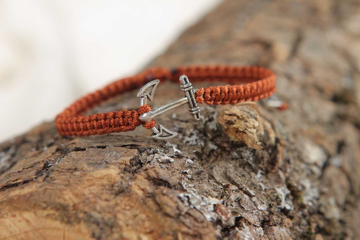 Handmade wrist friendship bracelet woven of cord of brown color with anchor  photo 4