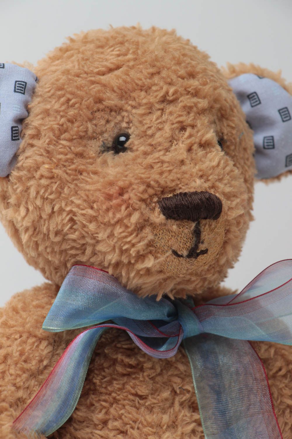 Handmade designer soft toy beige bear with blue bow for children photo 3