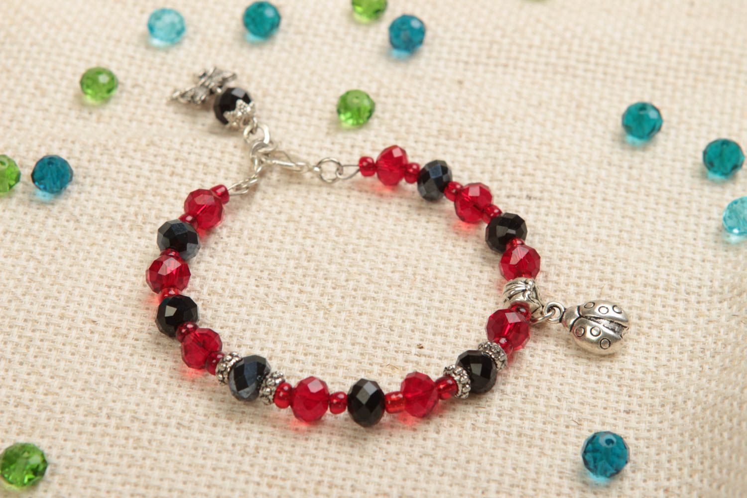 Dark red and black beads bracelet with silver ladybug charm for girls photo 1