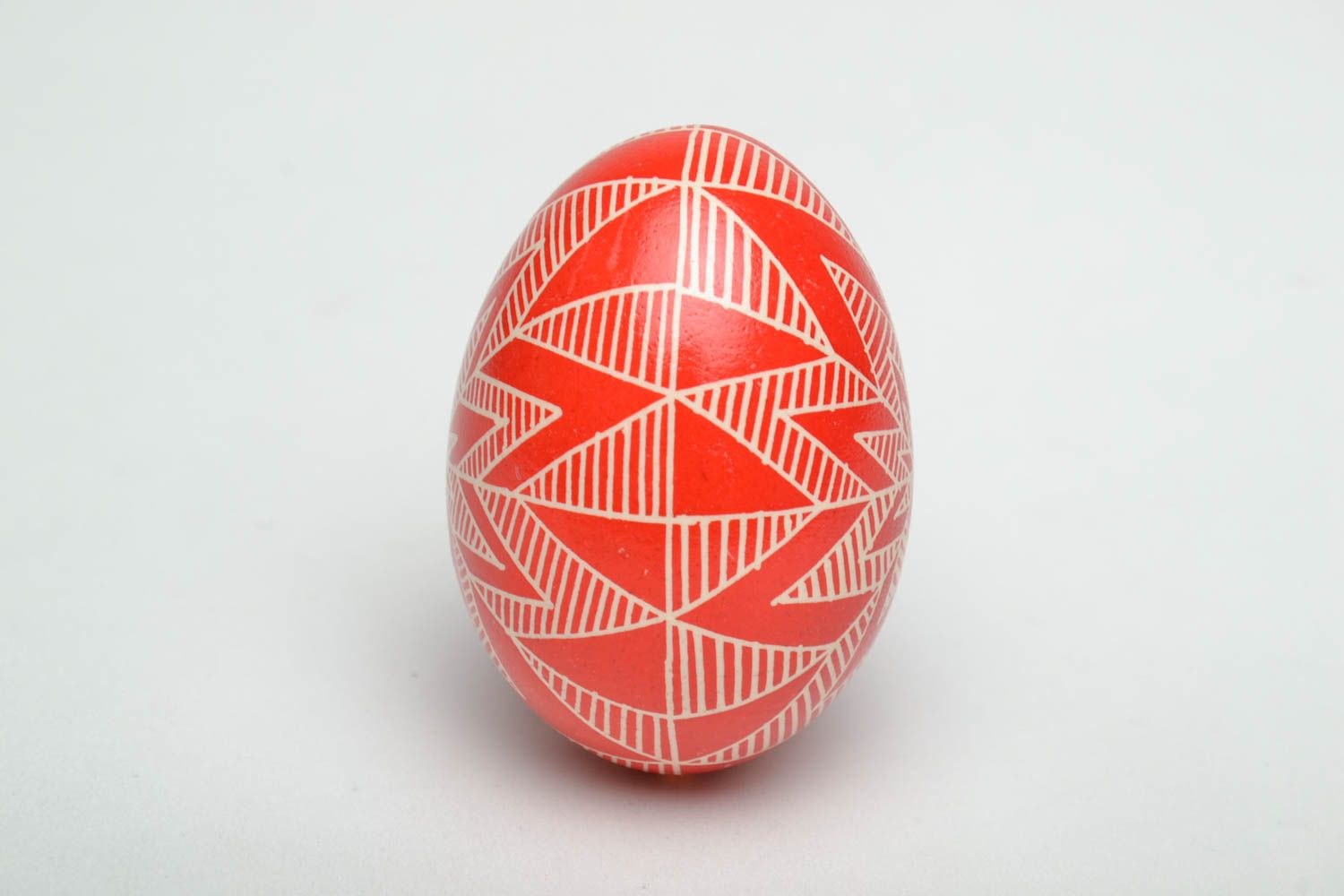 Painted chicken egg of red color photo 3