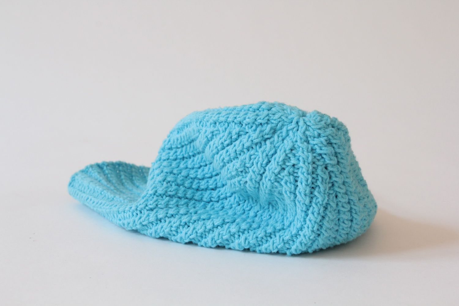 Blue knitted hat photo 3