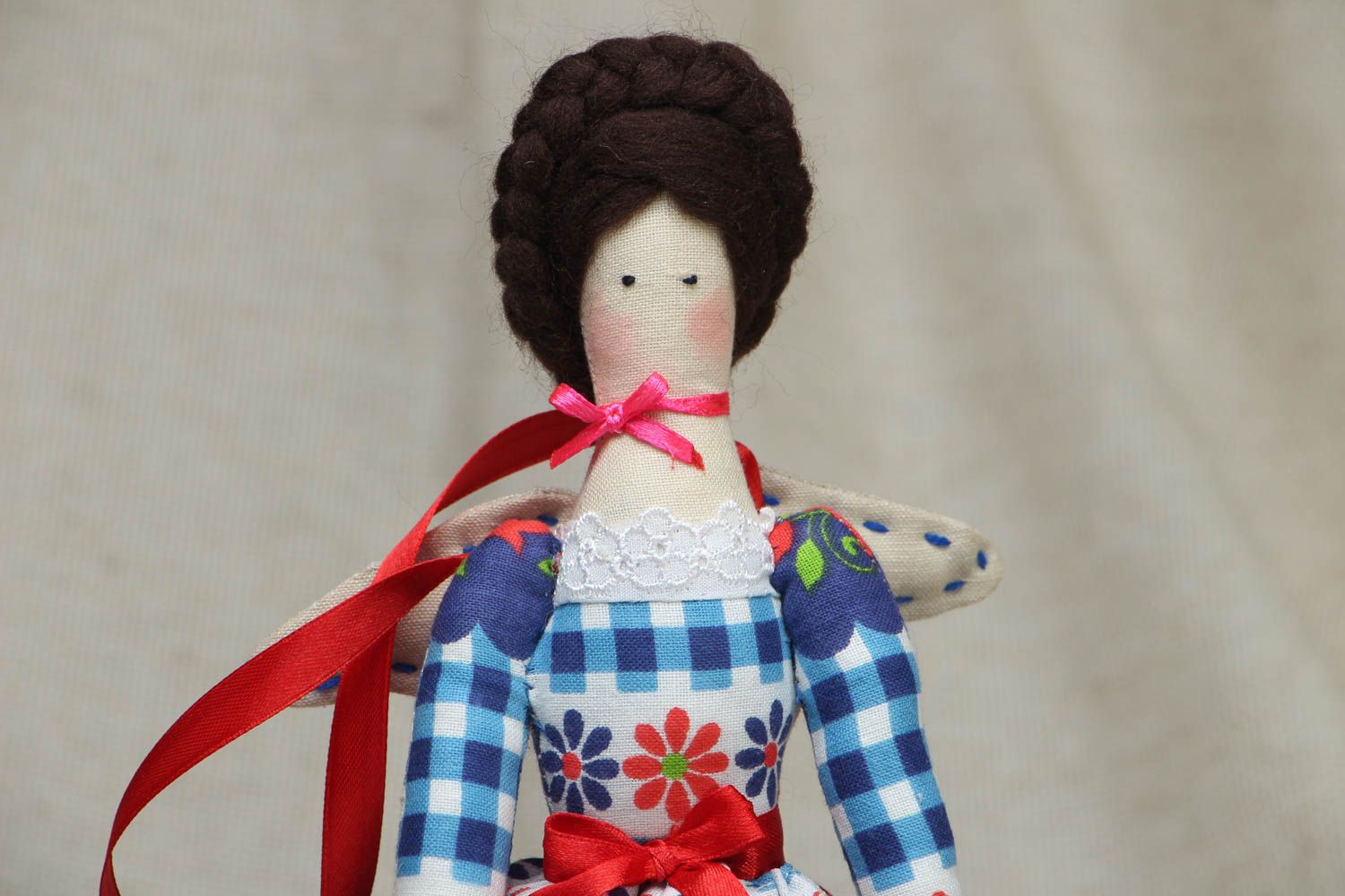 Textile doll for packages photo 2