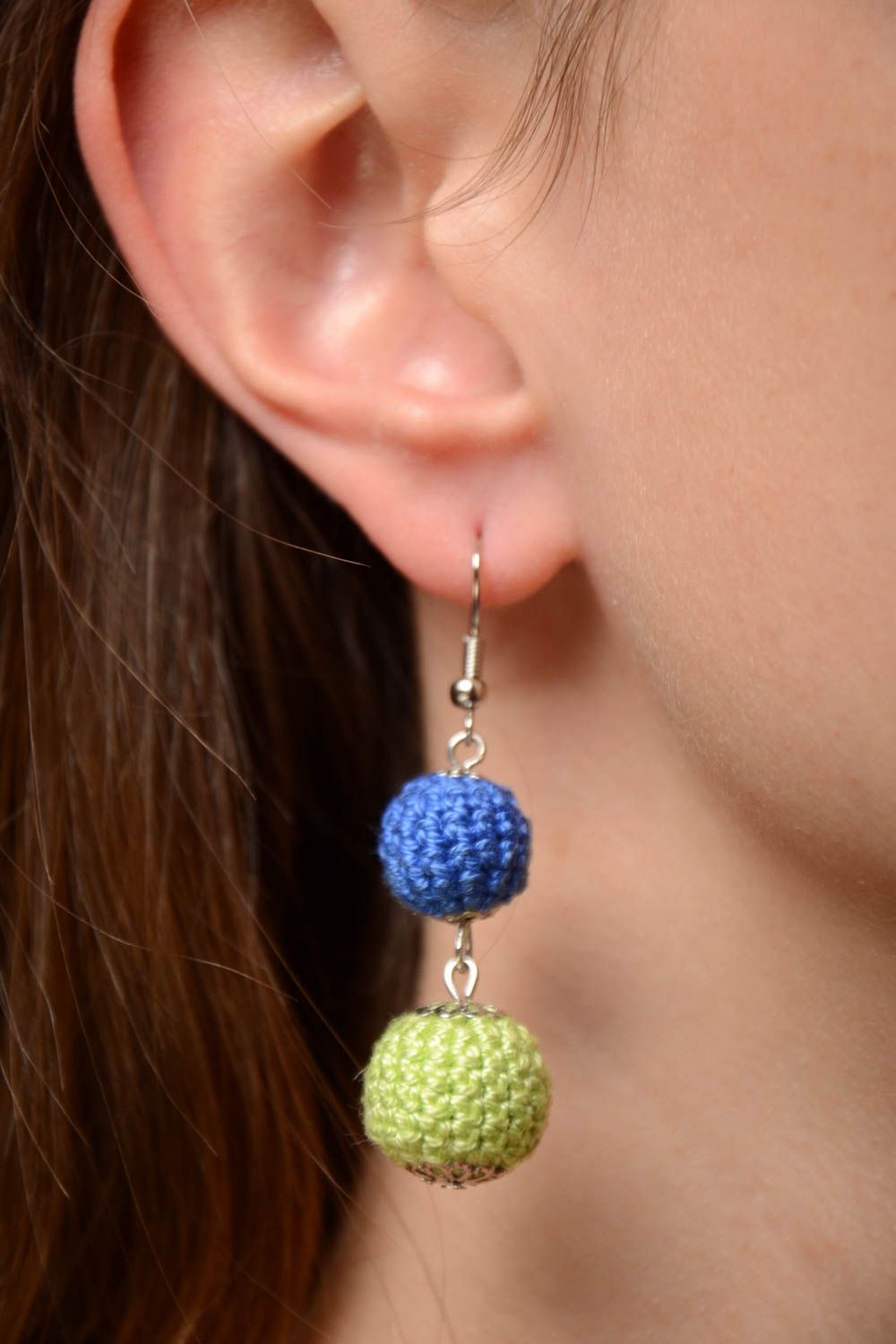 Handmade earrings with beads crocheted over with yellow and blue threads photo 2