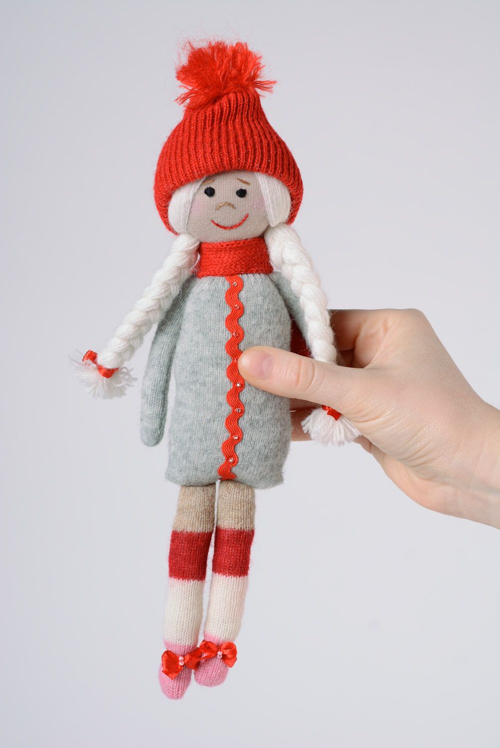 Small handmade cute doll sewn of fabric with red hat for little girls photo 1