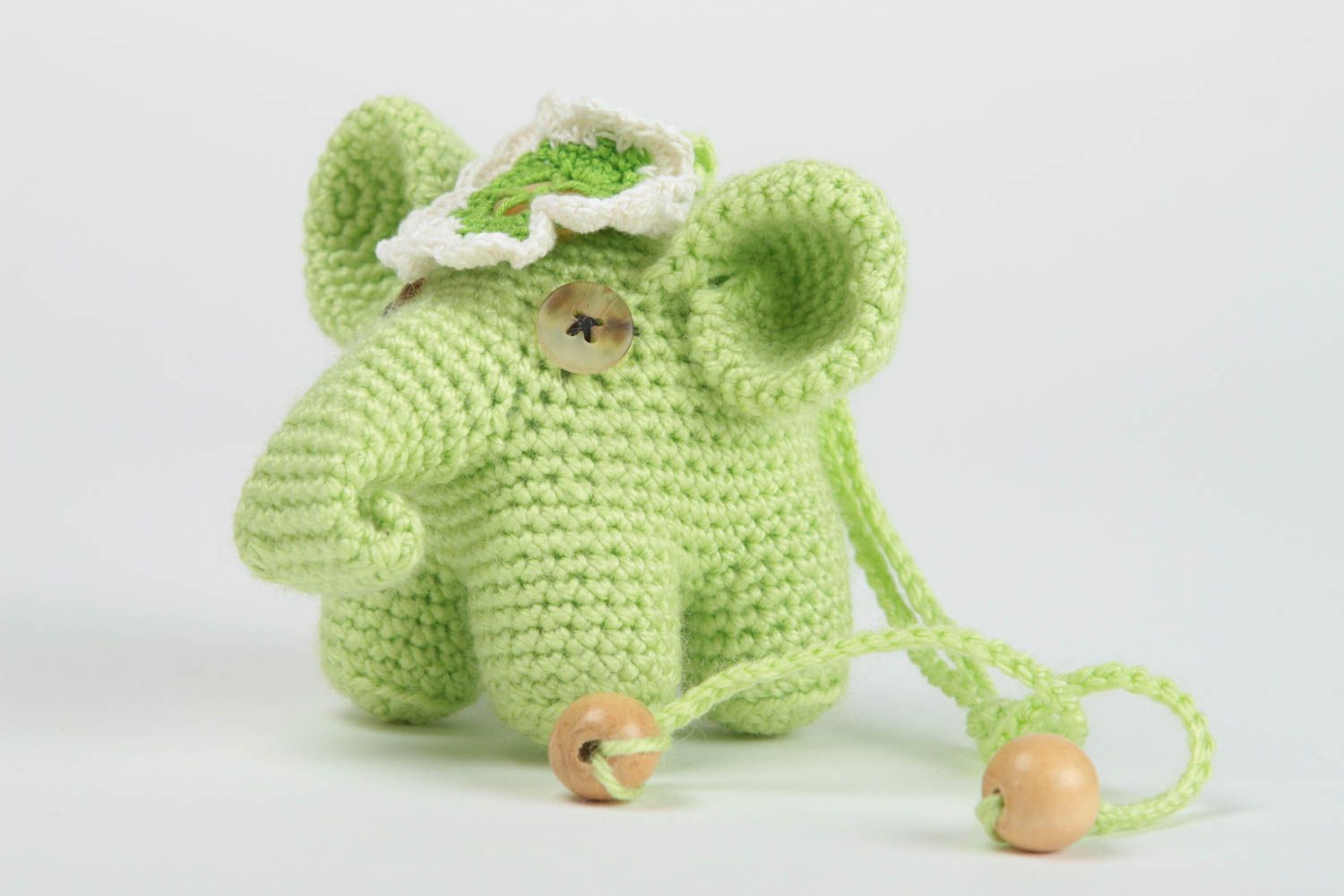 Juguete hecho a mano peluche para niño elefante de juguete verde tejido de hilos foto 2