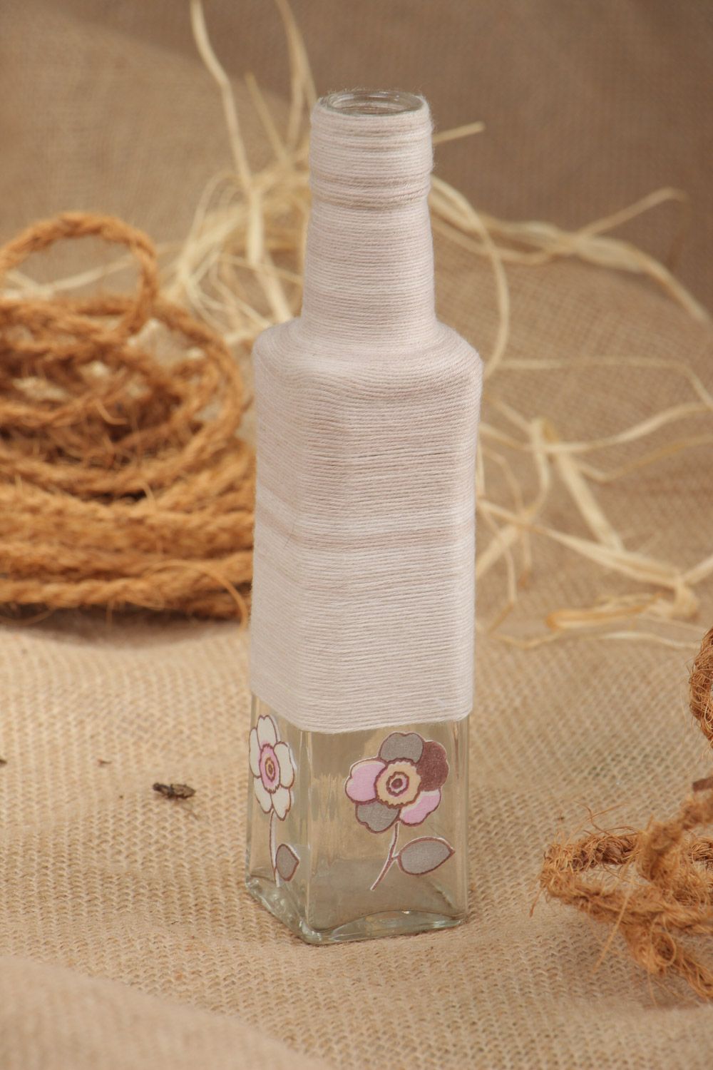 Decorative small glass bottle woven over with cotton threads handmade 250 ml photo 1