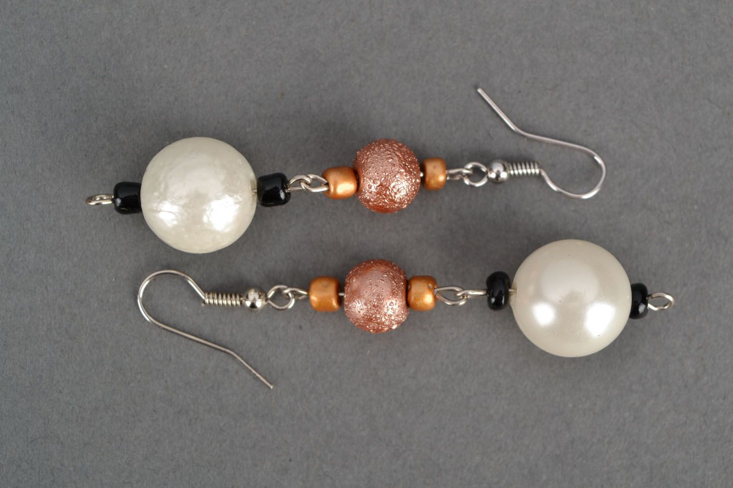 Long earrings with plastic beads photo 2