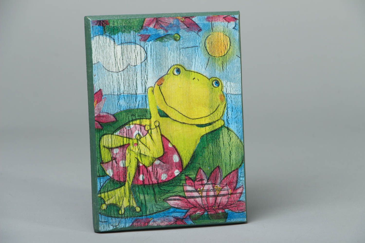 Tableau en serviettage Petite grenouille qui bronze photo 1