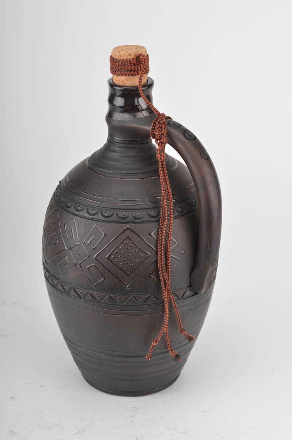 Unusual beautiful homemade dark ceramic bottle with pattern and cork 2 l photo 2