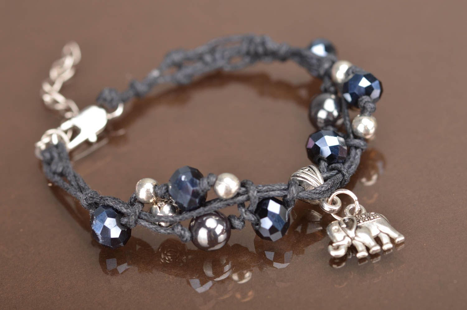 Bracelet en perles de cristal et lacet ciré tressé fin noir éléphant fait main photo 2