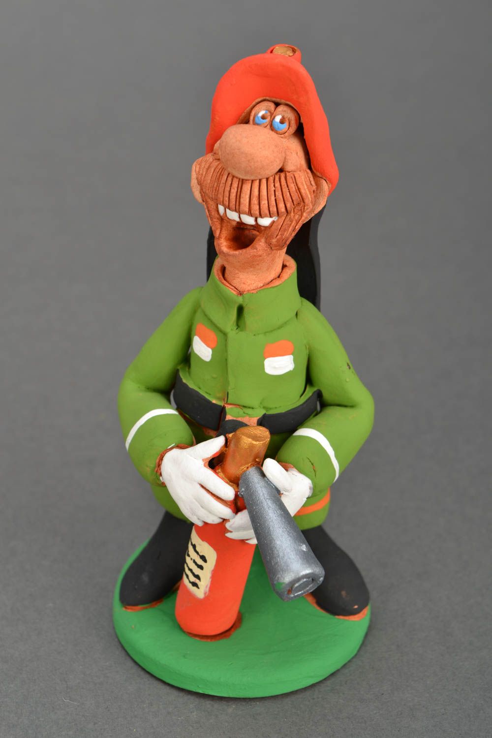 Ceramic figurine Firefighter with Fire Extinguisher photo 3