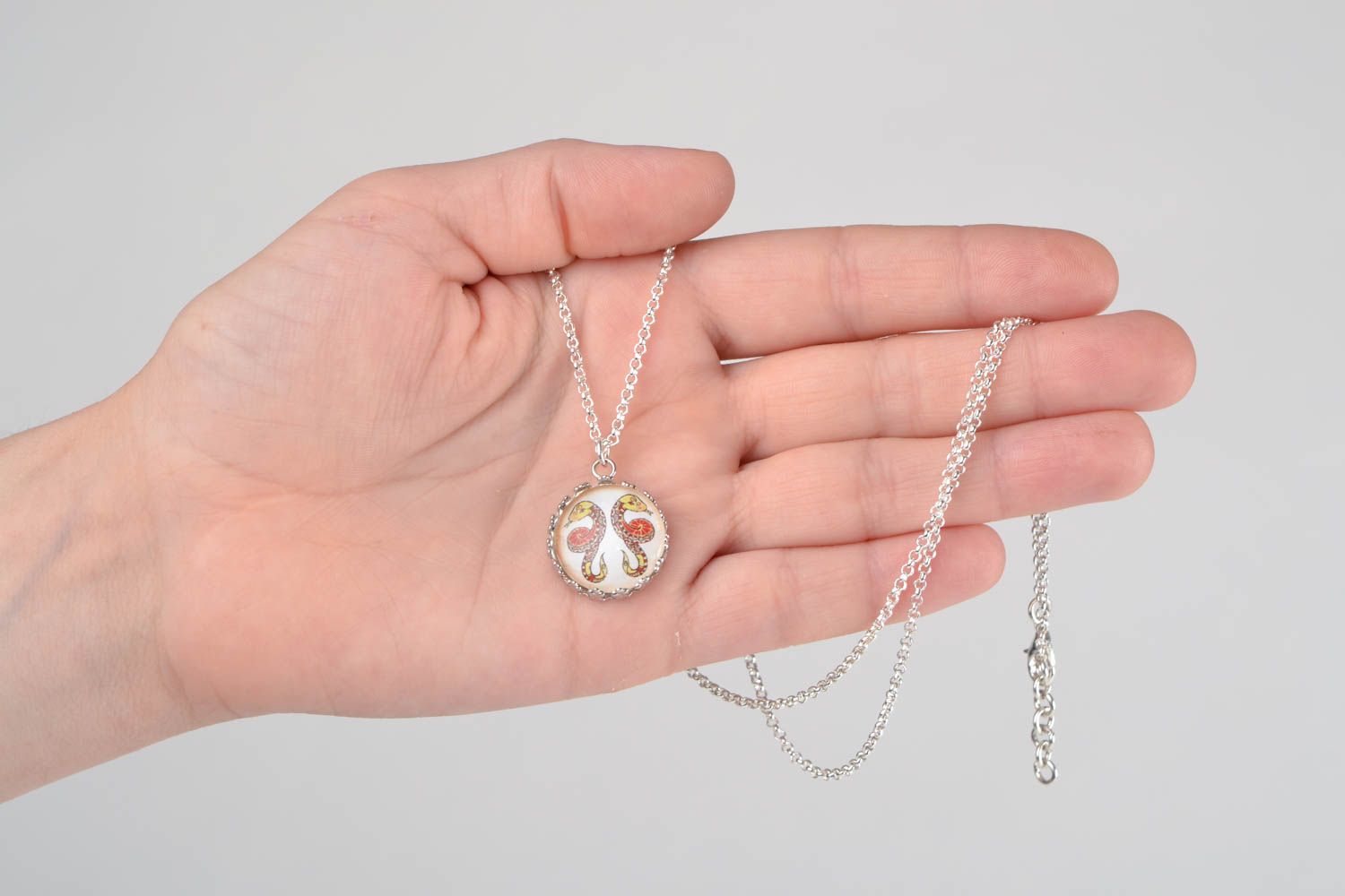 Handmade designer round white glass pendant with Gemini sign on metal chain  photo 2