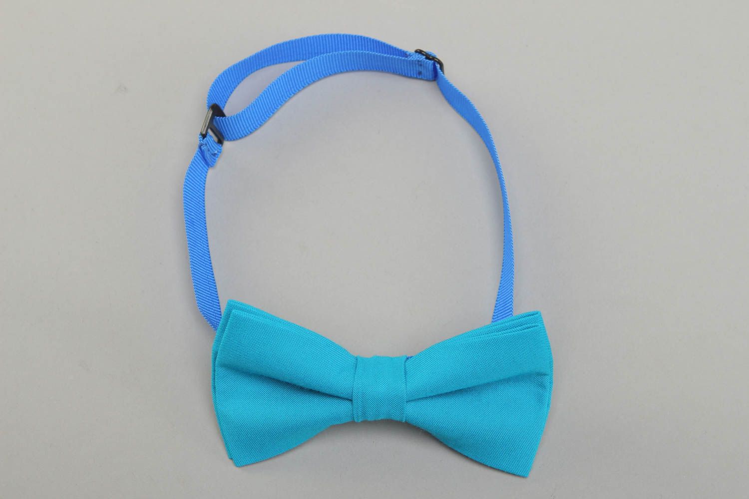 One-colored blue handmade fabric bow tie photo 1