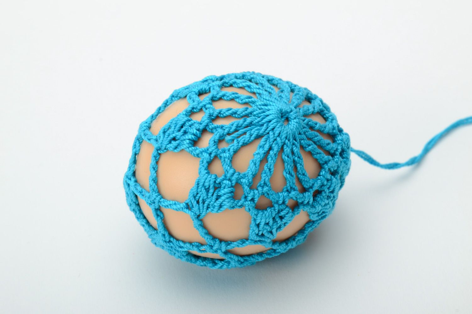 Homemade blue Easter egg crocheted over with cotton threads photo 2