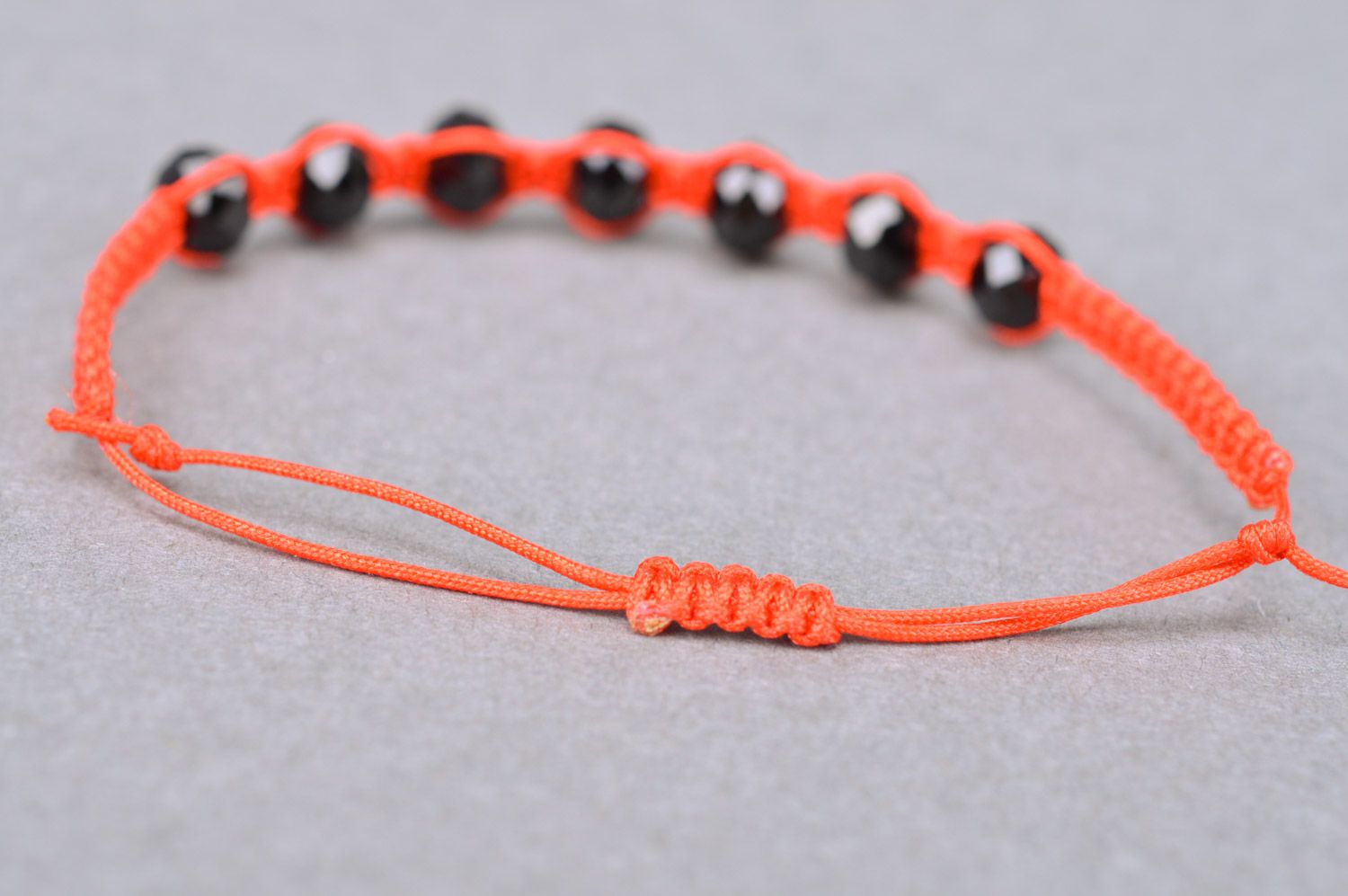 Handmade woven thread bracelet with beads of orange color and universal size photo 5