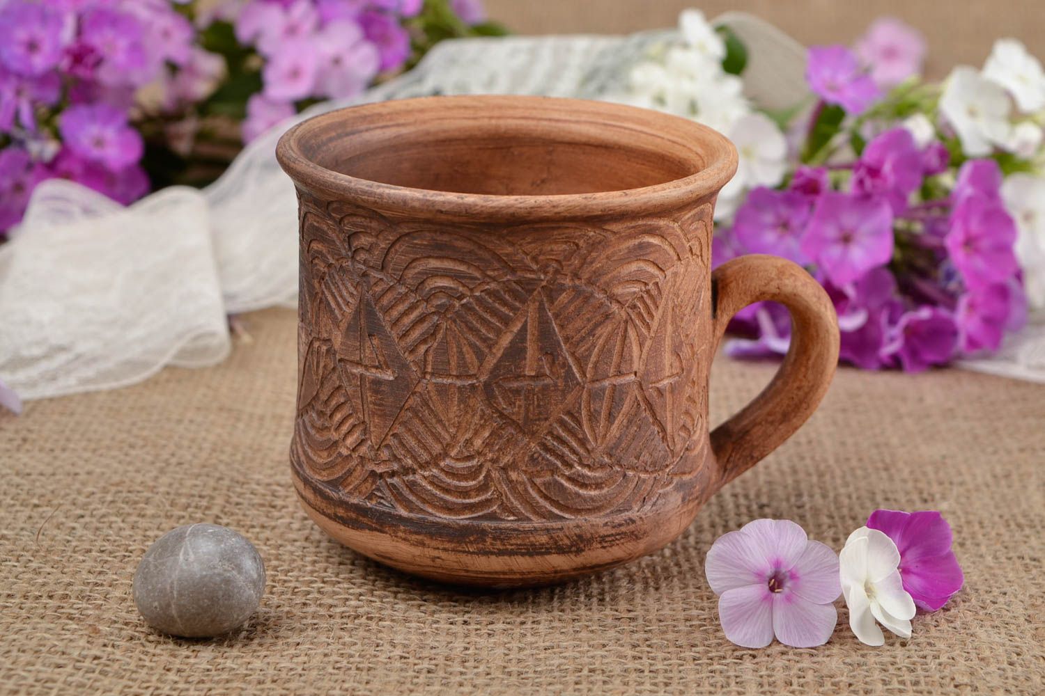 Medium size 5 oz clay cup with handle and rustic pattern photo 1