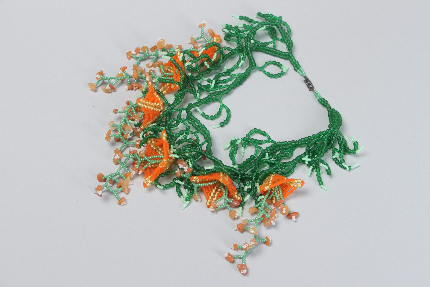 Handmade volume beaded necklace with natural stones in green and orange colors photo 2