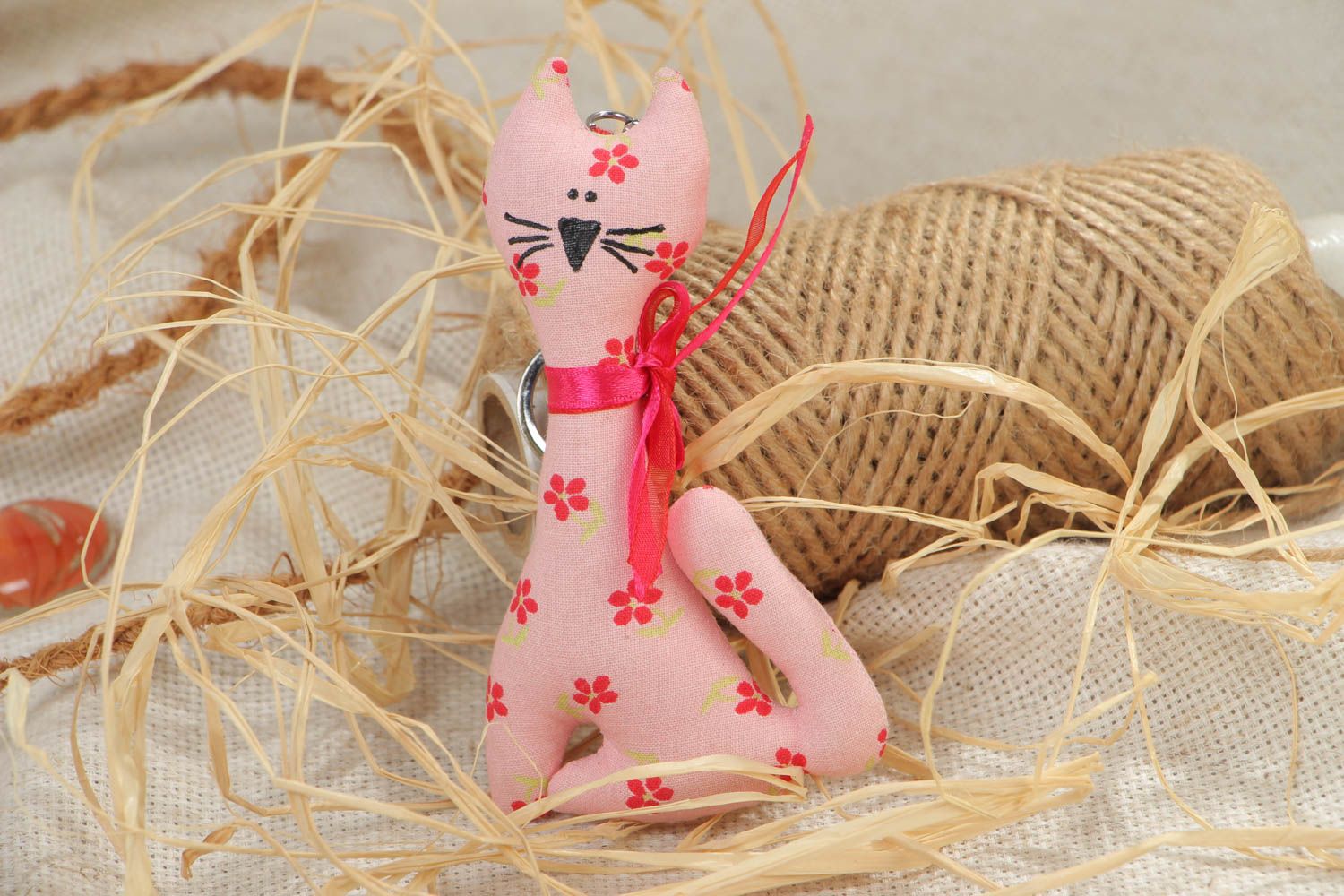 Handmade soft toy keychain sewn of pink polka dot cotton fabric in the shape of cat photo 1