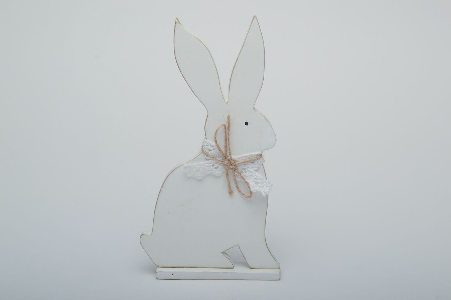 White wooden Easter rabbit painted with acrylics photo 2