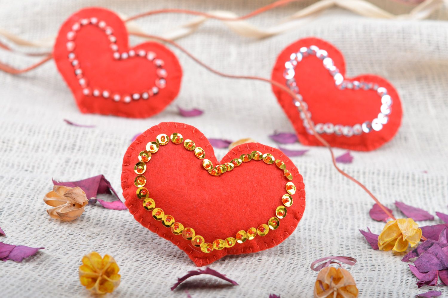 Handmade small red heart sewn of felt with spangles for interior decoration photo 4