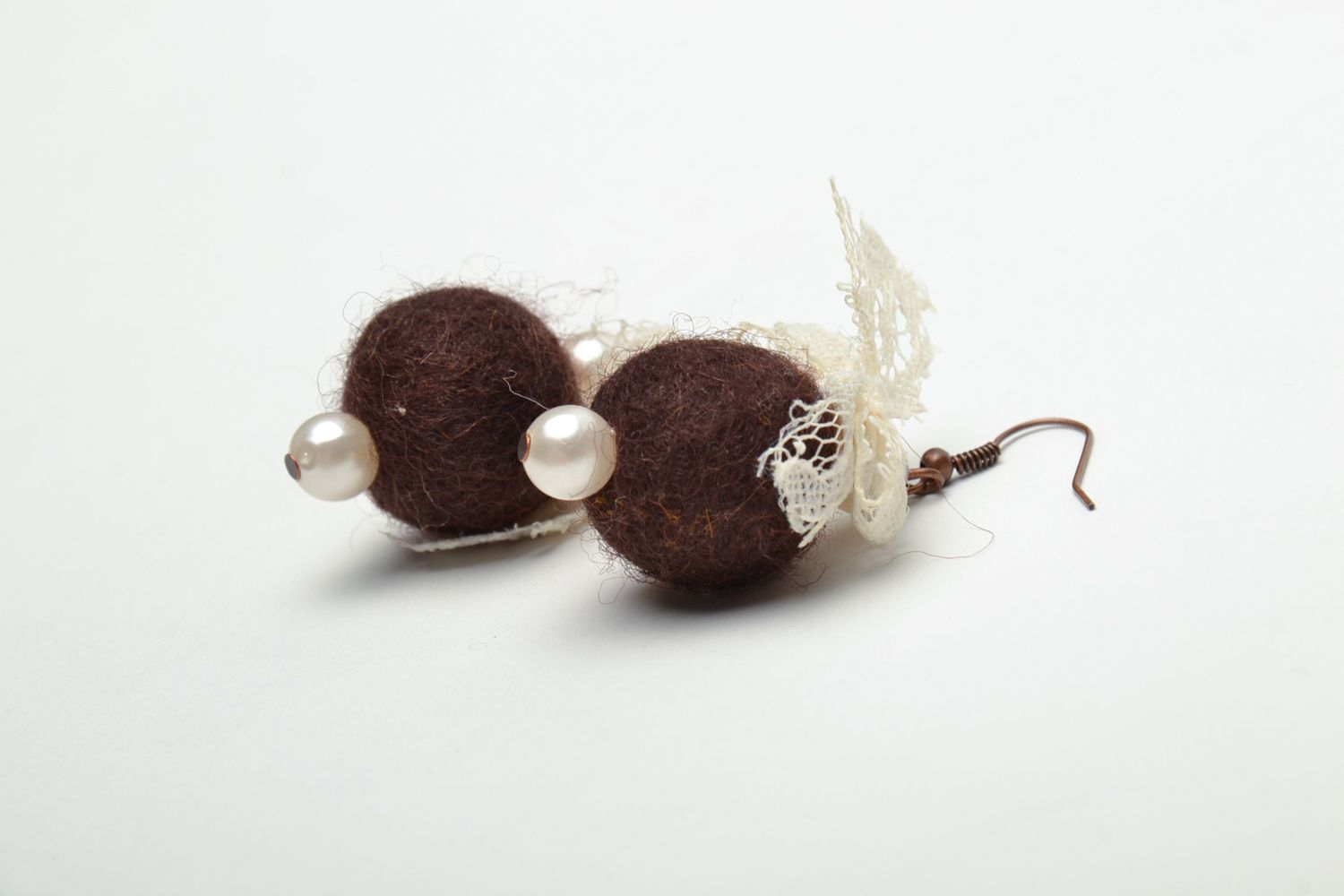Round felted wool earrings of brown color with pearls photo 4