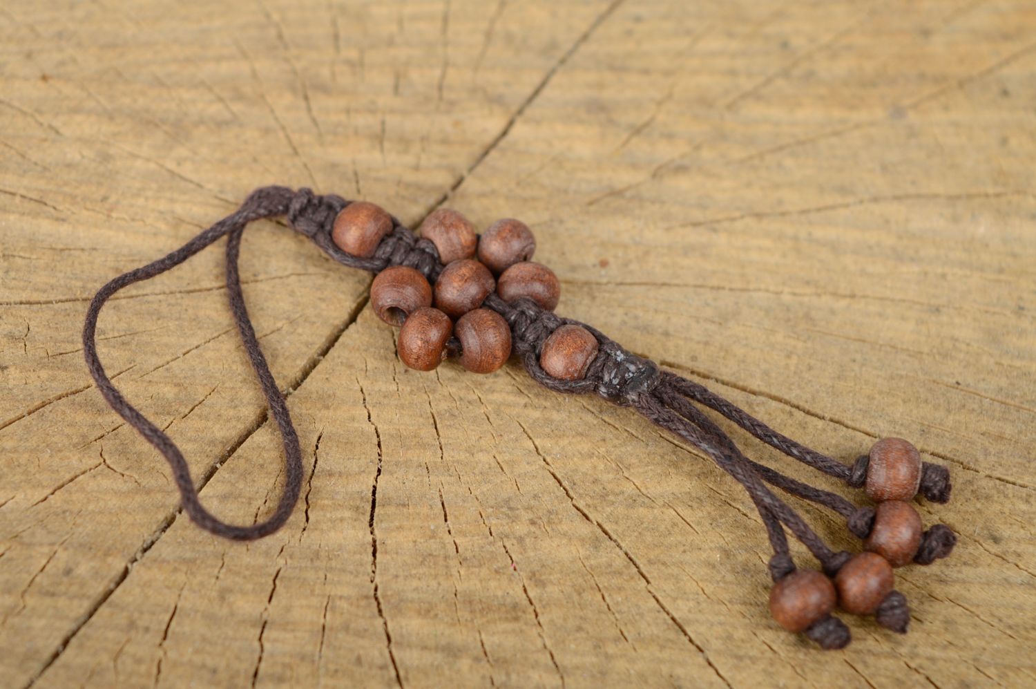 Macrame woven keychain with wooden beads photo 1
