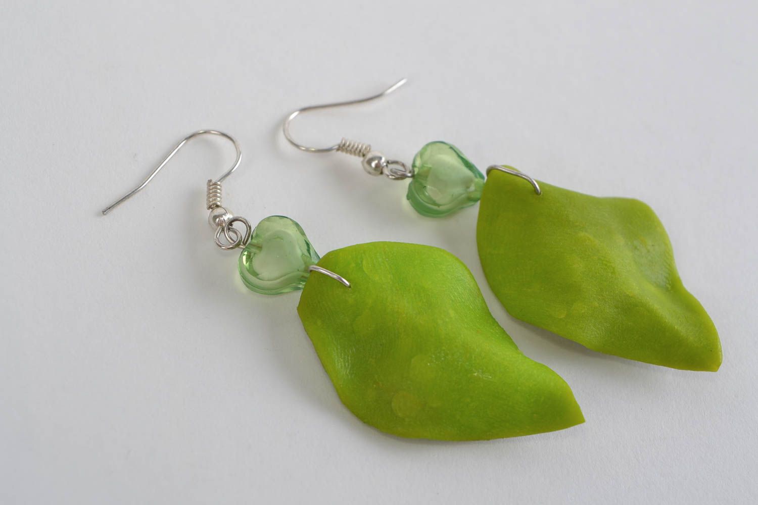 Large handmade green polymer clay earrings in the shape of leaves photo 5