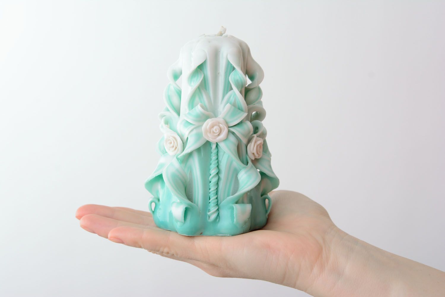 Carved candle of mint color photo 4