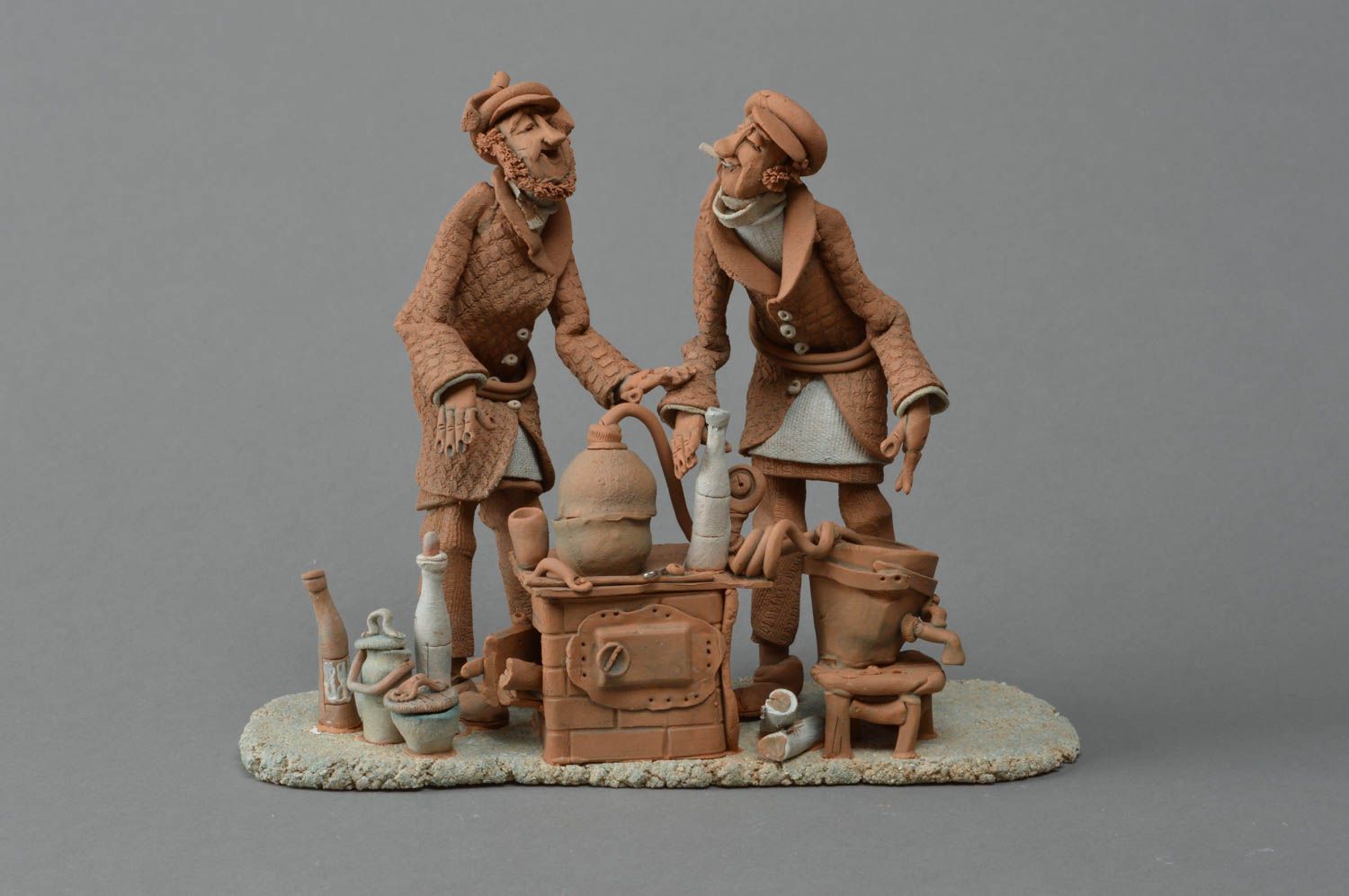 Handmade designer ceramic miniature sculpture Brewing white and red clay figurine photo 1