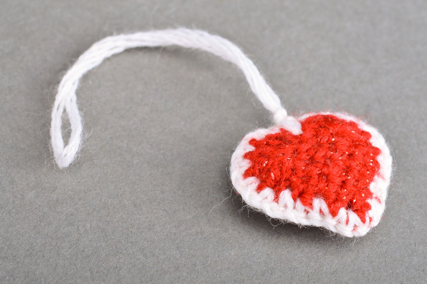 Handmade heart-shaped red and white keychain crocheted of semi-woolen threads photo 2
