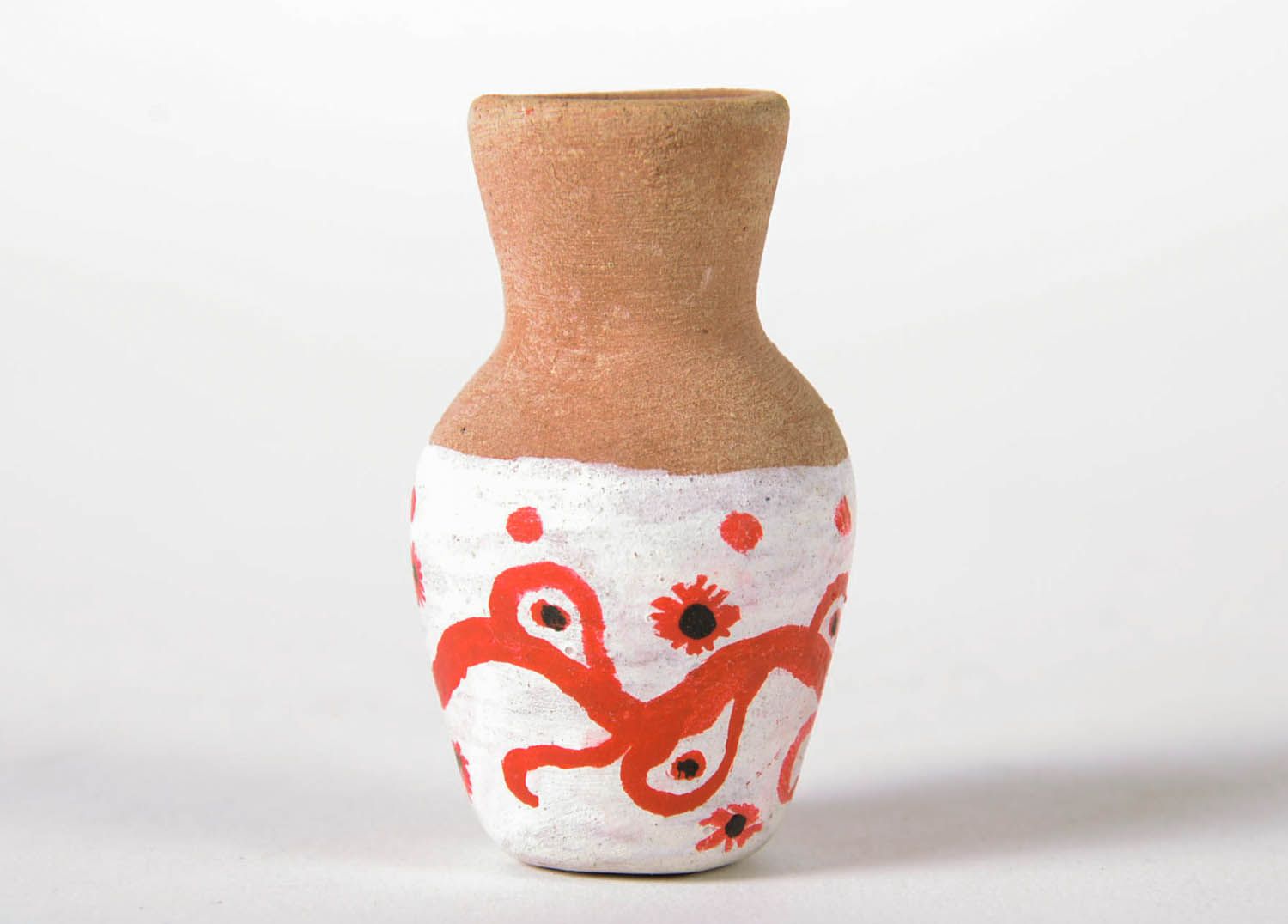 Vaso decorativo artesanal feito de barro pintado com tinta acrílica para  flores secas foto 2