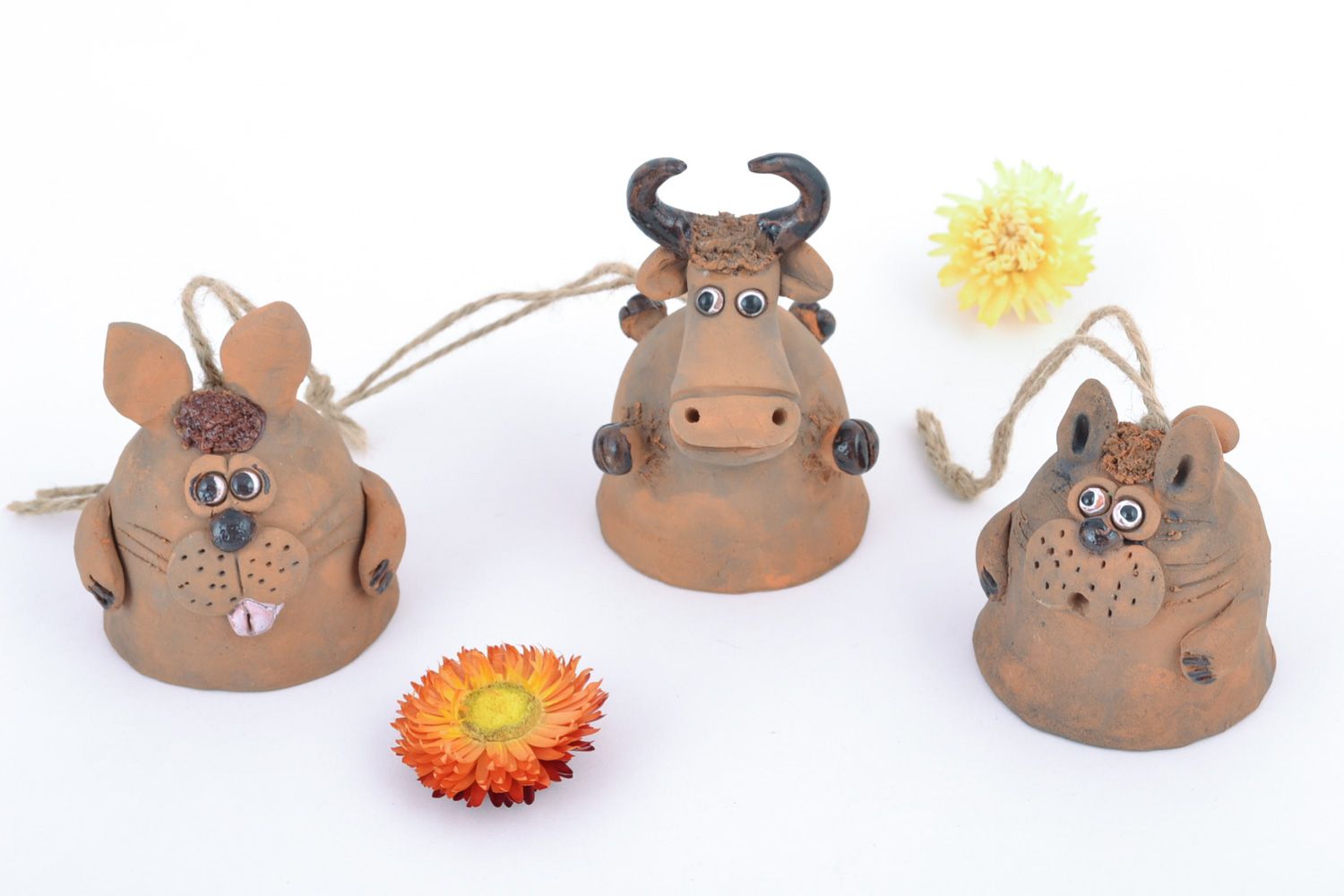 Set of handmade ceramic hanging bells in the shape of traditional toys animals photo 1