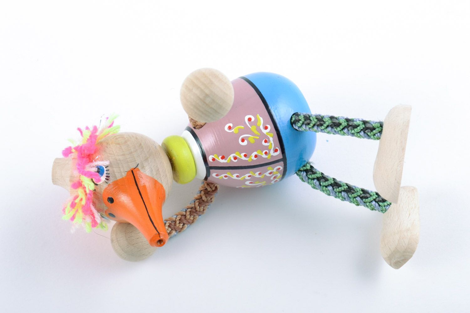 Красочная деревянная игрушка в виде утки ручной работы расписанная эко красками фото 5
