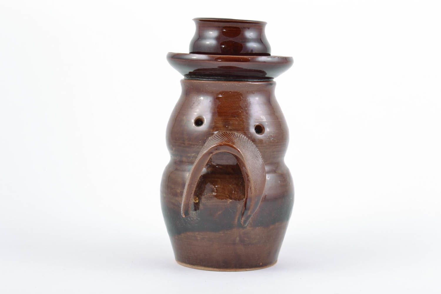 Schöner handmade Kerzenhalter aus Keramik mit Glasur bedeckt für eine Kerze foto 2