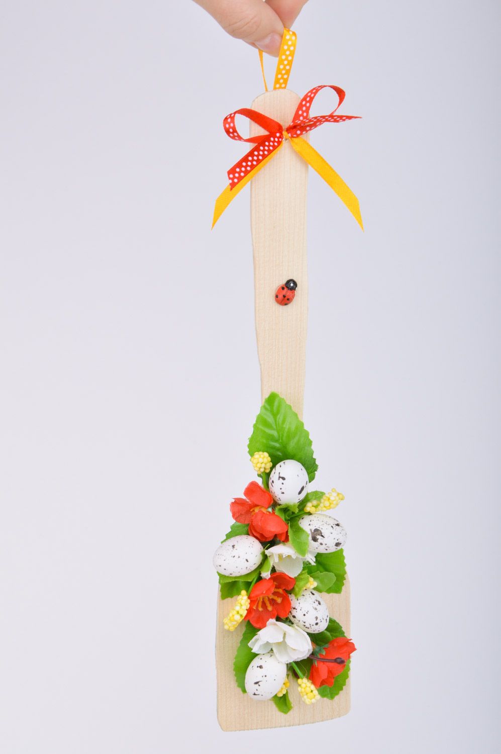 Handmade decorative wooden spatula with flowers and hollow eggs for wall decor photo 3