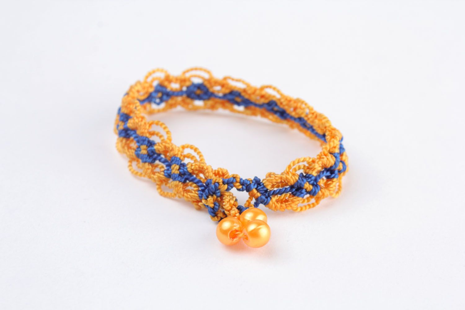 Yellow and blue woven bracelet photo 2